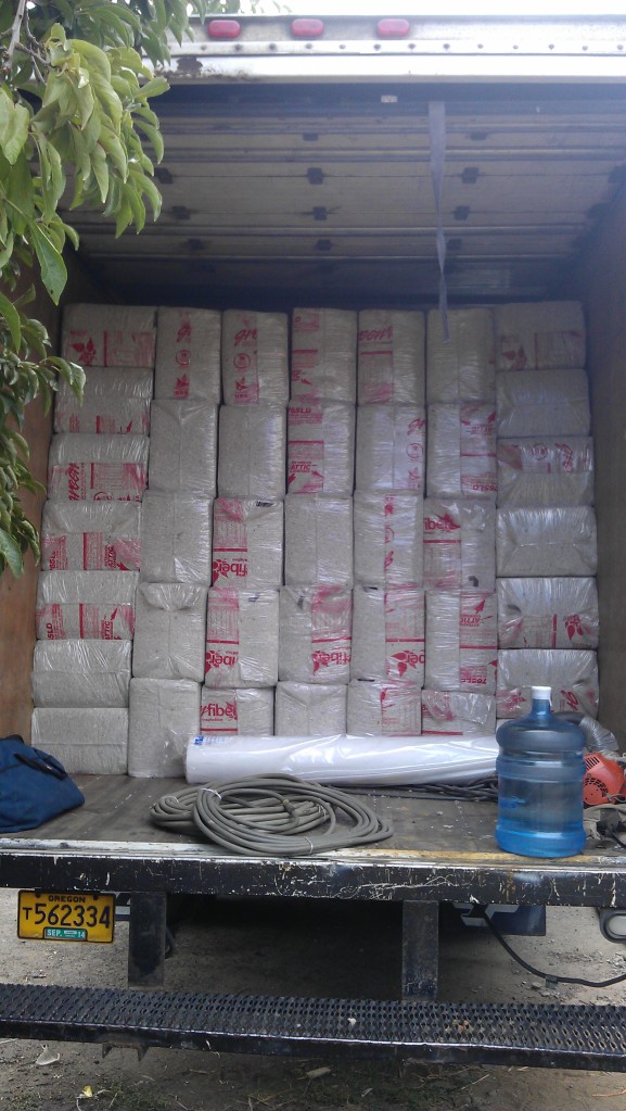 Dense Pack Cellulose Insulation (ground up newspapers treated w/ borate for insect and fire resistance) shows up on site!